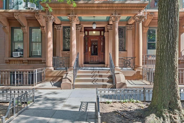 Property entrance with covered porch