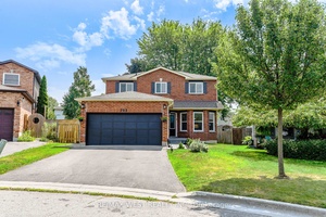 Welcome to this beautifully updated legal 2 suite home offering over 2, 800 sq.