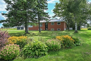 Discover the perfect blend of country charm and modern comfort in this spacious all brick bungalow, set on 3 acres in sought after Melancthon.