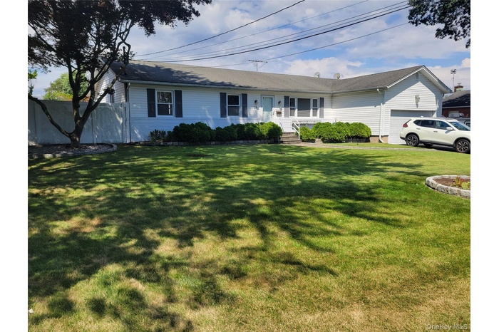 View of expanded ranch-style house