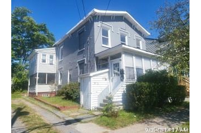View of front of property with stairway