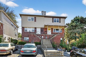 Legal two family ; spacious 3 bed 2 bath over a one bed.
