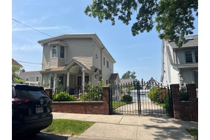 Rare opportunity ! ! Updated, South Facing, Legal 2 family in a quiet residential section of Whitestone.