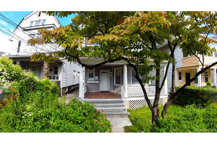 View of front of property featuring covered porch