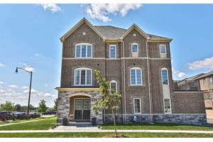 Welcome to this Beautifully Designed 3 1 Bedroom, 4 Bathroom, Freehold Townhome Offering 2, 400 sq.