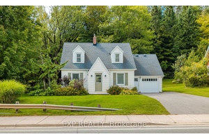 Nestled on 1. 8 landscaped acres with approx.