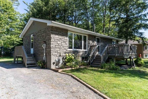 Upgraded 2 1 bed, 2 bath raised bungalow on a 100' x 200' lot located in a popular neighborhood only minutes from downtown amp ; steps from the Bracebridge Sportsplex.