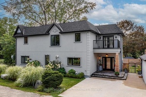 Pristine, one of a kind Custom Contemporary home built in 2021 is located in the Historical Lakeside Community of Orchard Beach and just steps to Lake Simcoe.