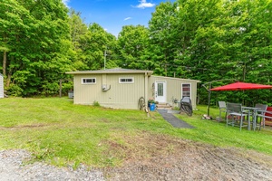 Tucked just a short walk from the shores of Three Mile Lake, this well maintained property offers a mix of comfort, efficiency, and easy lake access all on just over ...