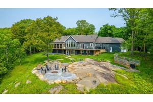 Experience refined lakeside living on the private shores of Loon Lake, where 800 feet of deep waterfront amp ; over 5, 000 sq ft of thoughtfully designed living space come ...
