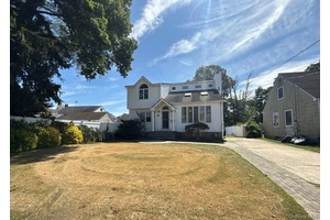 Great opportunity with this 4 bedroom, 3 bathroom Contemporary style home, with full basement, detached 2 car garage on a very deep rear yard.