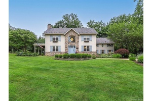 Welcome home ! This beautifully renovated Center Hall Colonial offers 5 bedrooms, 4.