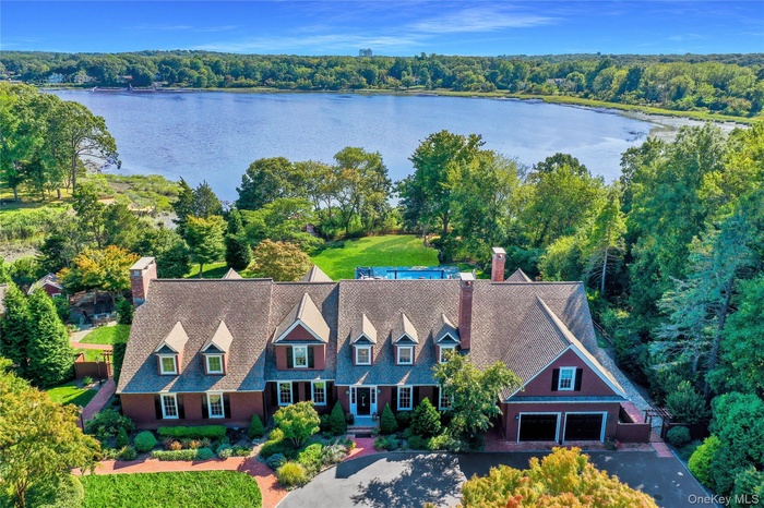 View of subject property with a nearby body of water