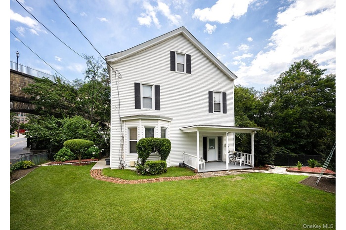 View of front of property with a porch