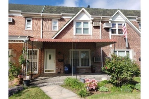 This solid brick one family home offers a main level with an entrance foyer with coat closet, a spacious living room, formal dining room, and eat in kitchen !