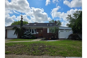Must see this lovely 4 Bedroom, 2 Full Bath Front to Back Split level home.