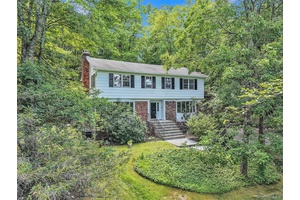 Tucked away in Cortlandt Manor in the Hendrick Hudson School System, nestled on a hill above a quiet, tree lined street is this spacious, classic 4BR, 3 1 2 BTH ...