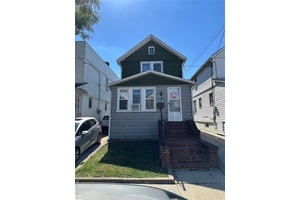 Detached single family Colonial with 3 bedrooms, 1 bath, x large remodeled kitchen, living room and porch.
