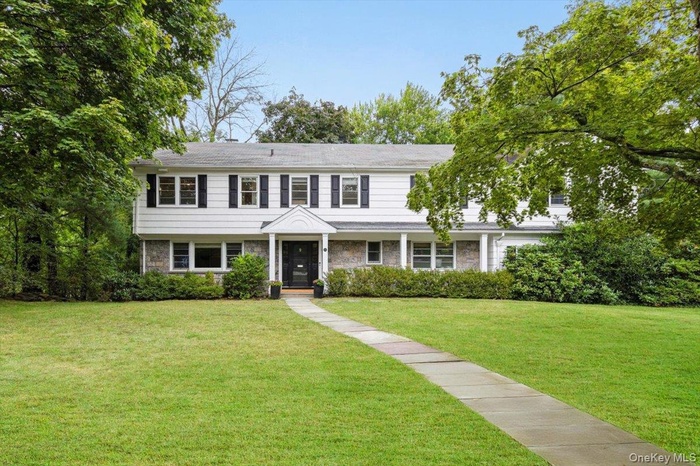 Welcome to 61 Lincoln Road, an inviting Scarsdale contemporary colonial
