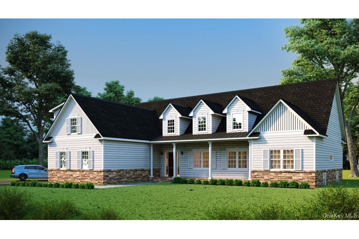 View of front of property with a front lawn
