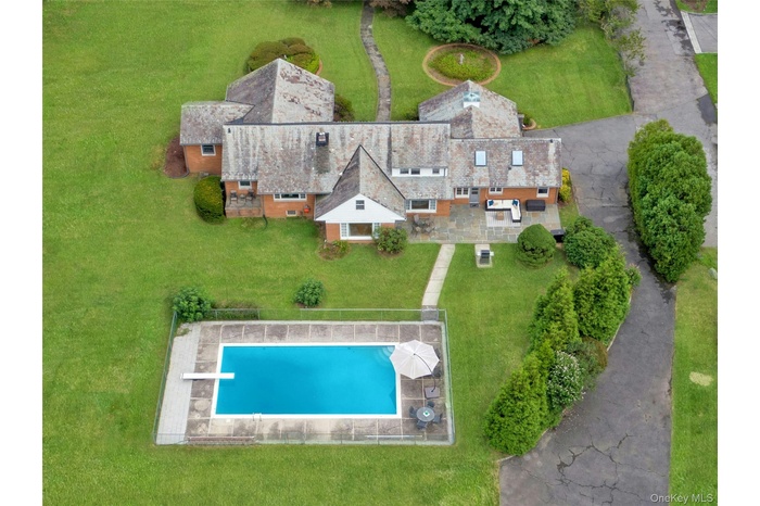 Welcome to 200 Fort Hill - an exceptional 1.06 level acre property boasting a main house, guest house and pool - ideal for everyday living and enterta