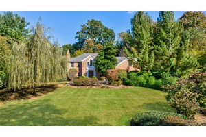 Exquisite custom built Center Hall Colonial in the prestigious Harriman Estates section of Sands Point.