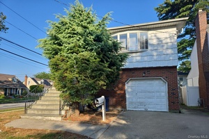 Large and spacious hi ranch style home situated on a corner parcel, having exceptional potential and being beautifully positioned for ease of access to stores, eateries, parks, and other area ...