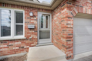 Welcome Home to this stunning bungalow townhome tucked away in a quiet, treed enclave in desirable Northwest London.