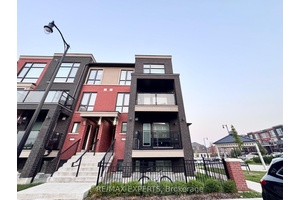 Welcome to this stunning corner unit townhouse, designed with extra windows for abundant natural light.