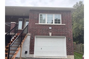 1 1 2 year new custom built legal duplex semi, upper level, on quiet street within walking distance to downtown Whitby, transportation, and all amenities.