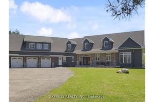 Welcome to this exquisite 6 year new custom built home, offering nearly 6, 100 sq.