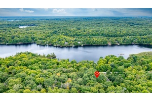 0. 62 acres, year round road access, and close proximity to town.