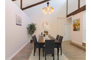Welcome to this exceptional, fully renovated multigenerational bungalow backing onto a tranquil ravine in one of Kitchener's most sought after neighborhoods !