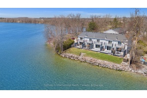 Price Reduced ! Rare opportunity to own a beautifully maintained end unit waterfront townhouse condo on Lake Simcoe.