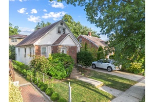 Welcome to 29 Butler Blvd, a beautiful Cape in Elmont offering a perfect blend of suburban tranquility and urban convenience.