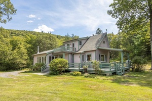 Nestled atop your very own private mountaintop, this captivating retreat is the sanctuary you've been dreaming of.