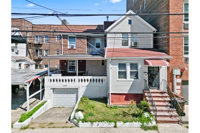 Traditional home with driveway and an attached garage