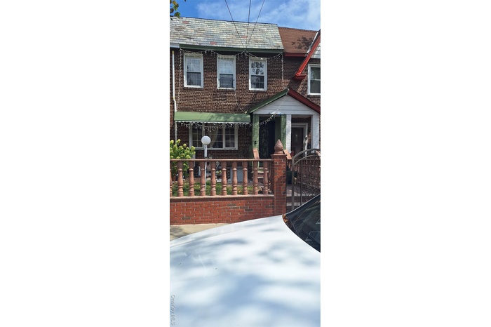 View of front of home with brick siding