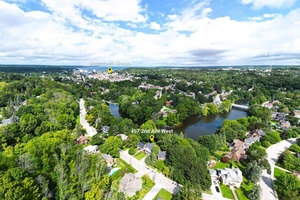 Nestled along the picturesque Sydenham River in the prestigious Millionaire Drive neighborhood, this stunning 4 bedroom, 3 bathroom estate seamlessly combines timeless elegance with modern sophistication.