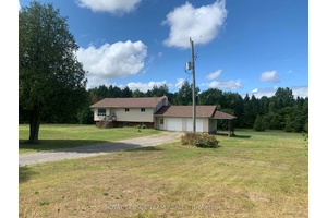 Check out this raised bungalow with walkout basement huge double car garage just 10 minutes from the town of Merrickville.