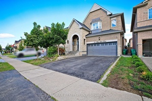 Welcome to this stunning fully detached home featuring 5 2 bedrooms and 6 bathrooms with an open concept layout designed for modern family living.