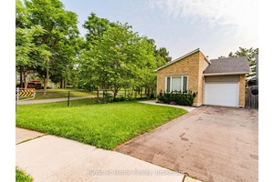 Rare find Bungalow on a premium corner lot.