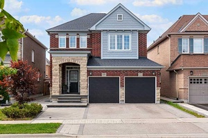 Welcome to 159 McDonnell, this lovely well maintained 4 1 bedroom is complete with a Finished Basement.