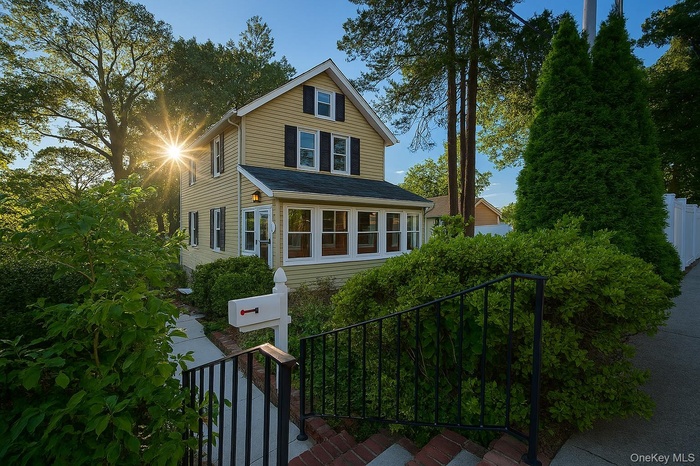 Traditional-style house with a sunroom