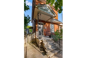 This 2 storey red brick home is full of possibilities for the right buyer.