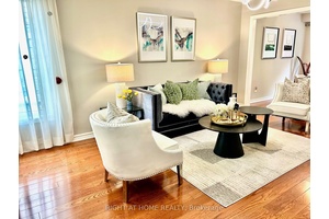 Beautiful Executive End Unit Townhouse Tucked Away In A Highly Sought After Complex.