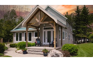 LUXURY. PRIVACY. WATERFRONT Experience refined lakeside living in this one of a kind luxury estate, gracefully set on 1.