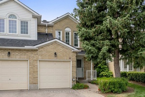 Welcome to this bright and spacious executive end unit townhouse that feels just like a semi !