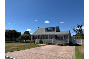 Welcome Home to this Large and bright expanded Cape style house.