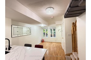 Welcome to this upgraded, charming two story townhouse in Thornhill Village !